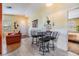 Cozy dining area featuring modern tile floors and a stylish table with seating for four at 201 11Th S Ave, Safety Harbor, FL 34695