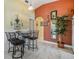 Bright breakfast nook with seating, pendant lighting, and view into other rooms at 201 11Th S Ave, Safety Harbor, FL 34695