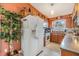 Bright kitchen with wooden cabinets, granite countertops, and stainless steel appliances at 201 11Th S Ave, Safety Harbor, FL 34695