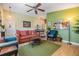 Living room showcasing a ceiling fan, and an open floor plan at 201 11Th S Ave, Safety Harbor, FL 34695