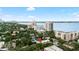 Beautiful aerial view capturing the building and surrounding cityscape with a clear blue sky and ocean in the distance at 2314 S Clewis Ct # 106, Tampa, FL 33629