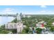 An aerial view shows a property nestled among mature trees and close to the waterfront at 2314 S Clewis Ct # 106, Tampa, FL 33629