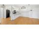 Open kitchen featuring modern appliances, granite countertops, and an eat-in area at 2314 S Clewis Ct # 106, Tampa, FL 33629