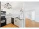 This updated kitchen has modern appliances, sleek black hardware, and granite countertops at 2314 S Clewis Ct # 106, Tampa, FL 33629