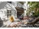 Private patio with brick pavers, gravel, and a covered grill, creating a relaxing outdoor space at 2314 S Clewis Ct # 106, Tampa, FL 33629