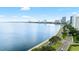 Water view featuring a scenic road along the waterfront with city buildings and blue skies in the background at 2314 S Clewis Ct # 106, Tampa, FL 33629