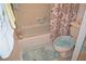 Clean bathroom featuring a shower-tub combination and a coordinated bath mat at 2725 14Th Ct, Palm Harbor, FL 34684