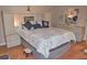 Bedroom with a queen-size bed, contemporary bedspread, and modern furnishings at 2725 14Th Ct, Palm Harbor, FL 34684