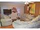 Comfortable living room with stylish furnishings and warm lighting at 2725 14Th Ct, Palm Harbor, FL 34684
