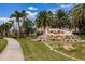 Beautiful community entrance with lush landscaping, water feature, and prominent 'Soleil' signage at 2855 Oriole Dr, Sarasota, FL 34243