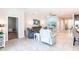 Bright living room boasting tile flooring, comfortable seating, and an open layout at 2855 Oriole Dr, Sarasota, FL 34243