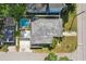 Aerial view of a home showing the pool, patio, backyard, and well-manicured lawn at 3131 W Fielder St, Tampa, FL 33611