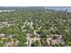 Expansive aerial view of a neighborhood with mature trees at 3131 W Fielder St, Tampa, FL 33611