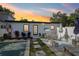 The outdoor space features a swimming pool, patio, and well-maintained landscaping at 3131 W Fielder St, Tampa, FL 33611