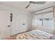 Comfortable bedroom with large closet doors and a neutral decor at 3131 W Fielder St, Tampa, FL 33611