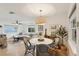 Bright dining area with views of the living room, record player and backyard at 3131 W Fielder St, Tampa, FL 33611