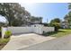 Ample parking on concrete driveway with privacy fence at 3131 W Fielder St, Tampa, FL 33611