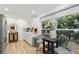 Bright, updated kitchen with white cabinets, stainless steel appliances, and eat-in breakfast nook at 3131 W Fielder St, Tampa, FL 33611