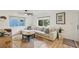 Bright living room featuring a comfortable sofa and modern decor elements at 3131 W Fielder St, Tampa, FL 33611