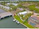 Aerial view of waterfront home with bridge and boat dock at 3901 Pompano Se Dr, St Petersburg, FL 33705