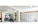 Spacious finished basement featuring exercise equipment, a mirror, and garage access at 3901 Pompano Se Dr, St Petersburg, FL 33705