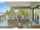 Inviting covered deck with ample seating and serene water views at 3901 Pompano Se Dr, St Petersburg, FL 33705