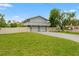 Charming home with a spacious three-car garage and a large, well-manicured lawn, perfect for curb appeal at 3901 Pompano Se Dr, St Petersburg, FL 33705