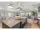 Kitchen with a view of the dining area and living room at 3901 Pompano Se Dr, St Petersburg, FL 33705
