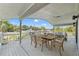 Outdoor patio with dining and lounge furniture, offering scenic views at 3901 Pompano Se Dr, St Petersburg, FL 33705