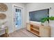 Stylish living room with wood floors, TV, and decorations at 400 38Th Ne Ave, St Petersburg, FL 33703