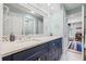 Spacious bathroom featuring double sinks and marble countertops at 4121 Highland Park Cir, Lutz, FL 33558