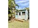 Backyard studio with a fresh coat of paint, a wood deck, and string lights at 4501 26Th S Ave, St Petersburg, FL 33711