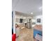 Well-lit kitchen with stainless steel appliances, light countertops, and ample cabinet space at 4501 26Th S Ave, St Petersburg, FL 33711