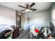 Bright office space with two desks and modern ceiling fan at 4610 Courtland St, Tampa, FL 33610