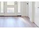 Bright entryway with glass panel door and sidelights allowing natural light to fill the space at 5051 Gevalia Dr, Brooksville, FL 34604