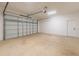 Spacious two car garage with neutral paint and room for storage at 5051 Gevalia Dr, Brooksville, FL 34604