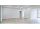 Spacious living room with hardwood floors and plenty of natural light at 5051 Gevalia Dr, Brooksville, FL 34604