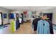 Interior view of pro shop featuring displays of apparel and golf equipment at 5051 Gevalia Dr, Brooksville, FL 34604