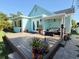 Inviting backyard deck area perfect for outdoor dining and entertaining at 5201 18Th S Ave, Gulfport, FL 33707
