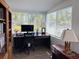 Bright office space with large windows, modern desk, and ample natural light at 5201 18Th S Ave, Gulfport, FL 33707