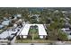 Aerial view of a U-shaped two-story apartment building with a landscaped courtyard, showcasing a serene community setting at 525 9Th N Ave # 2, St Petersburg, FL 33701