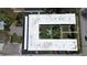 Aerial view of the building with a large courtyard, lush greenery, and convenient parking at 525 9Th N Ave # 2, St Petersburg, FL 33701