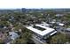 Bird's eye view of a U-shaped, two-story apartment building with a courtyard, parking, and trees in a quiet neighborhood at 525 9Th N Ave # 2, St Petersburg, FL 33701