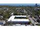 High aerial view of a U-shaped, two-story apartment complex with parking lot and verdant green surrounding area at 525 9Th N Ave # 2, St Petersburg, FL 33701