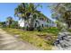 Lush landscaping and a sidewalk lead to Edward Laycock's Uptown Place building in this exterior shot at 525 9Th N Ave # 2, St Petersburg, FL 33701