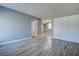 Spacious living room featuring wood-look floors and ample closet space at 525 9Th N Ave # 2, St Petersburg, FL 33701