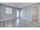 Bright living room with a light gray wood flooring and lots of natural light at 525 9Th N Ave # 2, St Petersburg, FL 33701