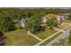 Aerial view of a stunning home with a large yard and screened in pool at 5913 Flatwoods Manor Cir, Lithia, FL 33547