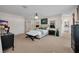 Spacious main bedroom includes a sitting area and ensuite bathroom at 5913 Flatwoods Manor Cir, Lithia, FL 33547