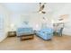 Spacious living area with high ceilings, abundant light, and comfortable furnishings at 6208 Country Club Way, Sarasota, FL 34243